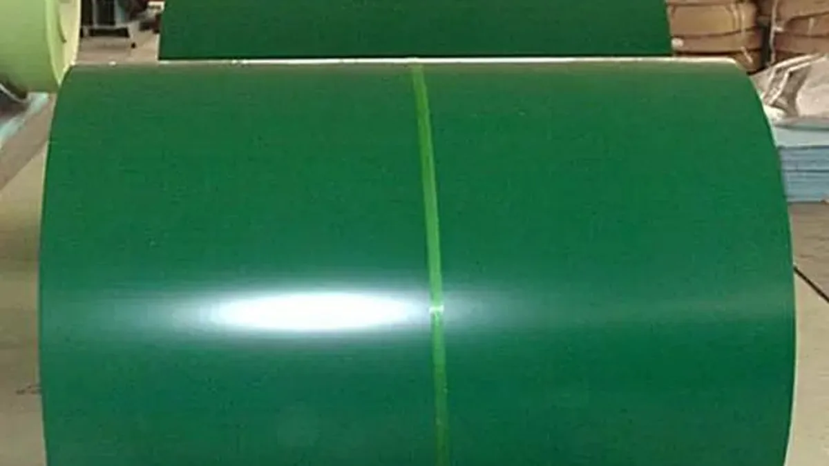 Buyer inspecting the finish and edge of a prepainted coil